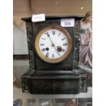 A late 19th century slate mantle clock