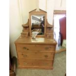 An early 20th century pine dressing chest