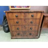 A 19th century flame mahogany chest of four graduated drawers