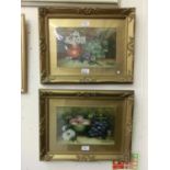 A pair of framed and glazed oil on boards of still life signed bottom right
