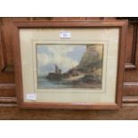 A framed and glazed watercolour of beach scene signed King