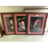 A set of three framed painting on fabrics of oriental gentlemen smoking