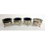 A set of four Edwardian open salts. Hallmarked for Birmingham 1909, makers mark for R H Thornton .