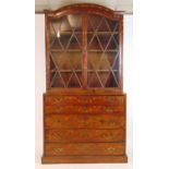 An 18th century mahogany and marquetry secretaire book case, the dome cornice over two astragal