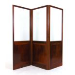 An early 20th century mahogany three fold screen, glazed panels above fielded blind panels, h. 152