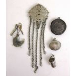 An early 20th century silver plated chatelaine together with two chatelaine pin cushions, a