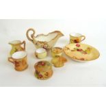 A collection of small Royal Worcester Blush Ivory ceramicware to include a cream boat, miniature