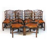 A set of ten (2+8) early 20th century walnut dining chairs in the 18th century style, the carved and