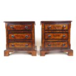 A pair of 19th century walnut and ebony banded table chests, the top over three drawers on bracket