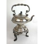 A 19th century Elkington silver plated spirit kettle and stand with serpent twist handle and