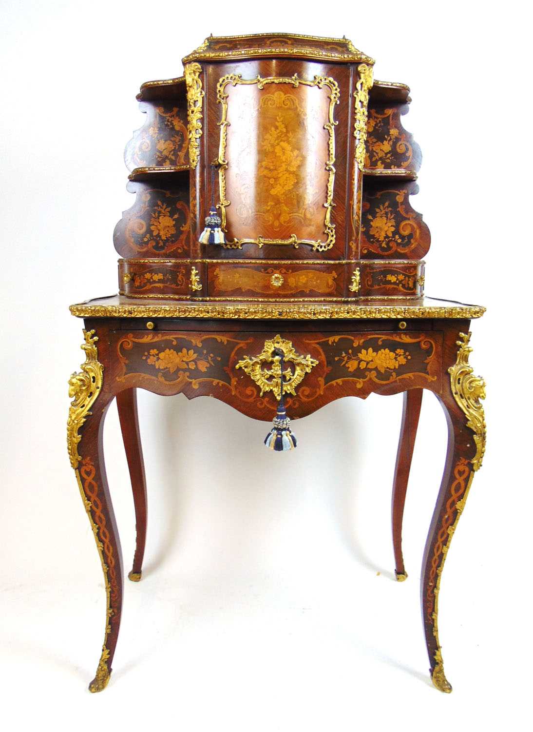 A 19th century French rosewood, marquetry and gilt brass mounted side cabinet, the galleried top