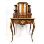 A 19th century French rosewood, marquetry and gilt brass mounted side cabinet, the galleried top