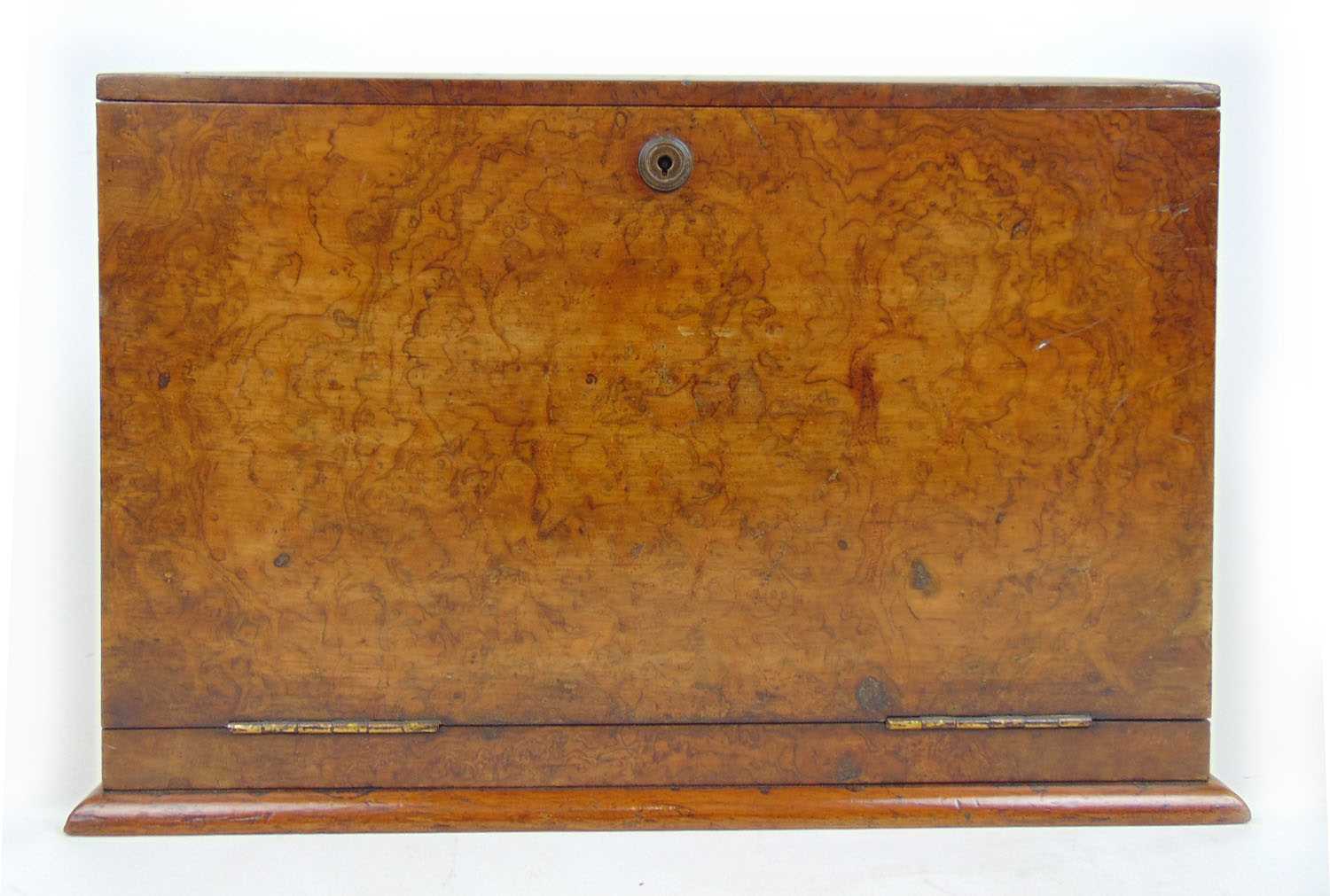 A 19th century burr walnut ladies travelling desk with brass carry handles. No key so interior