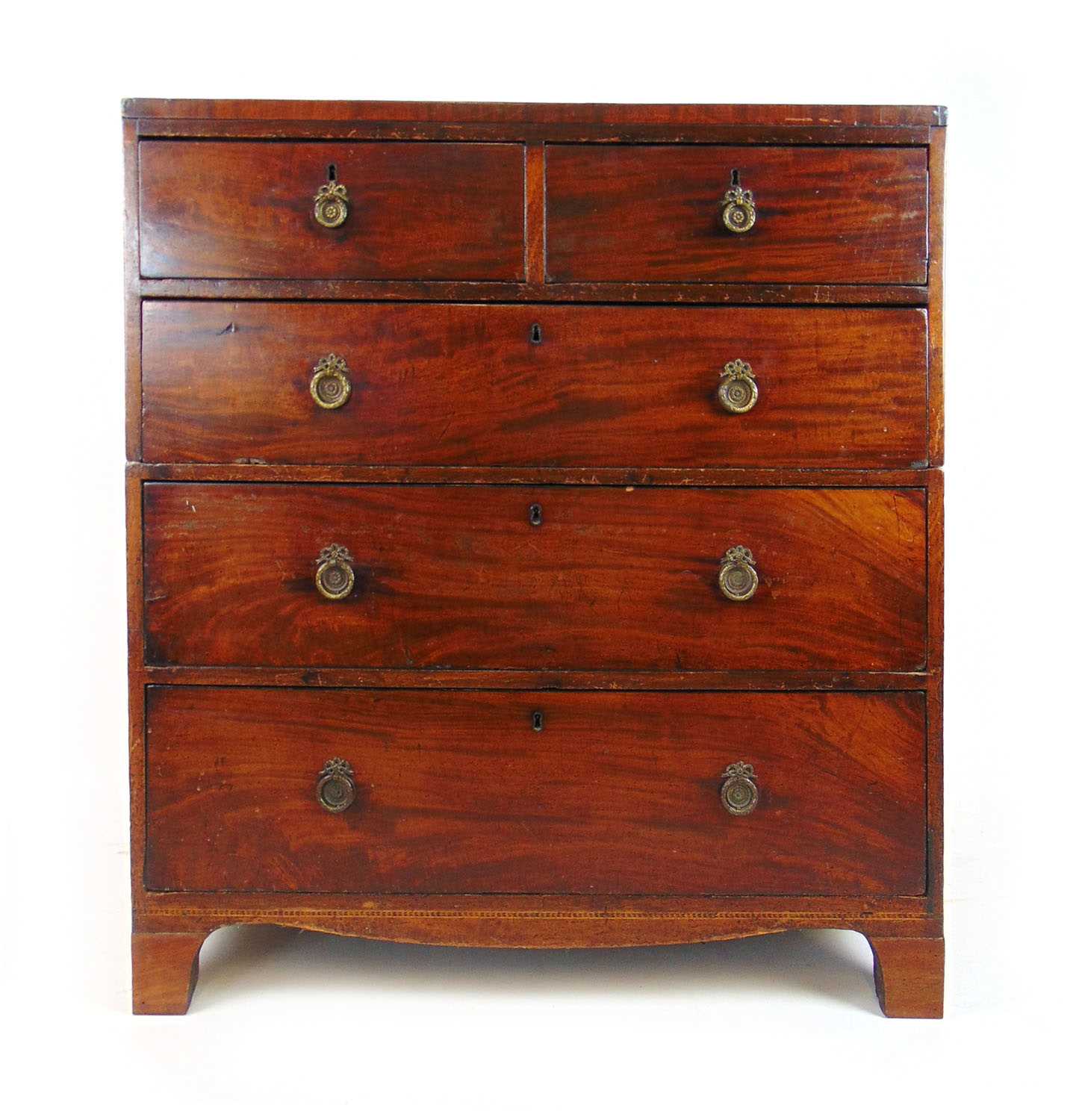 A late 18th century mahogany chest of two short over three long drawers, the caddy top over the