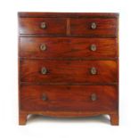 A late 18th century mahogany chest of two short over three long drawers, the caddy top over the