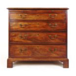 An 18th century mahogany chest of four long drawers, the top over brushing slide on bracket feet, h.