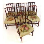 A set of seven (6+1) late 18th century mahogany dining chairs, the top rail over three back rails