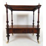 A Victorian rosewood two tier whatnot with turned supports over single drawer, h. 69 cm, w. 61, d.