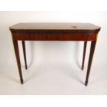 A late 18th/early 19th century mahogany and satinwood banded card table, the fold over top supported