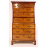 An 18th century mahogany chest on chest, the dental cornice over two short and three long drawers on