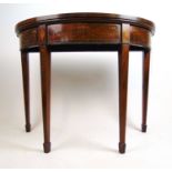 An Edwardian mahogany, rosewood banded and marquetry demi-lune card table, the top supported on a