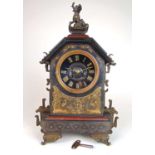 A late 19th century slate and brass mounted chinoiserie mantle clock, the movement by Japy