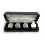 A cased set of four Edwardian silver heart shaped menu holders. Hallmarked for Chester 1904,