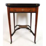 An Edwardian rosewood and marquetry envelope card table, the four segment top over a single drawer