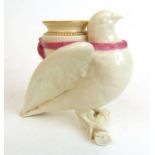 A Royal Worcester posy vase in the form of a dove with urn. Date mark for 1867, h. 15 cm