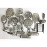 A large collection of Victorian and later putto design mainly dressing table items to include