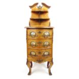 A 19th century French burr walnut boxwood strung and brass mounted chest of drawers. The