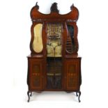 An Edwardian mahogany, boxwood strung, satinwood banded and marquetry display cabinet, the