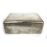 A late Victorian silver presentation cigar box. Hallmarked for London 1901, makers mark William