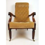 A Regency rosewood open arm chair upholstered in a buttoned beige fabric, the moulded frame on