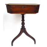 An 18th century mahogany and oak banded work table, the top lifting to reveal a silk lined