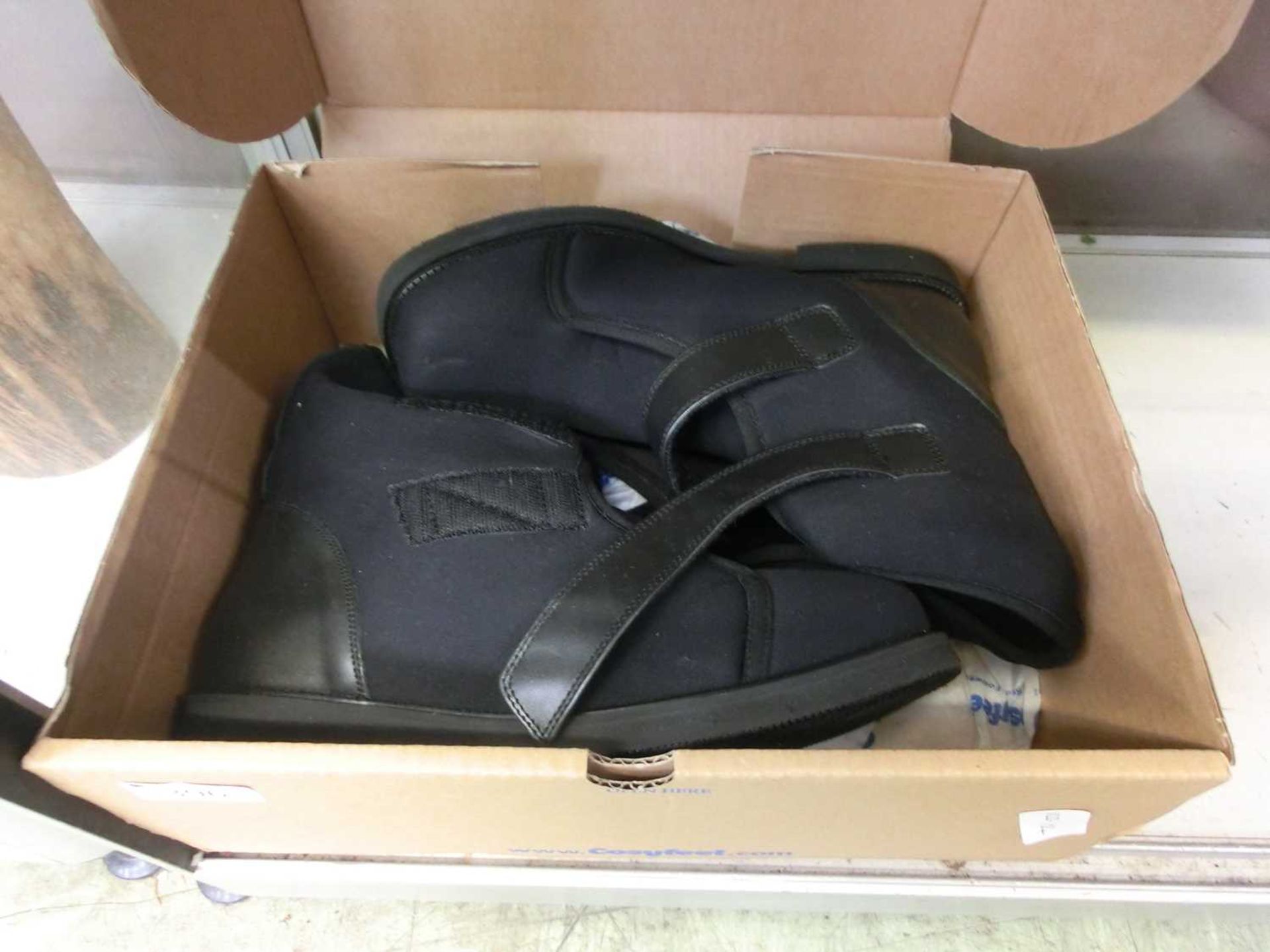 A pair of size 9 black Cosyfeet boots