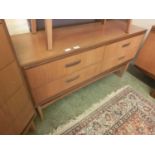 A mid-20th century four drawer chest