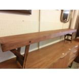 A mid-20th century folding child's school bench