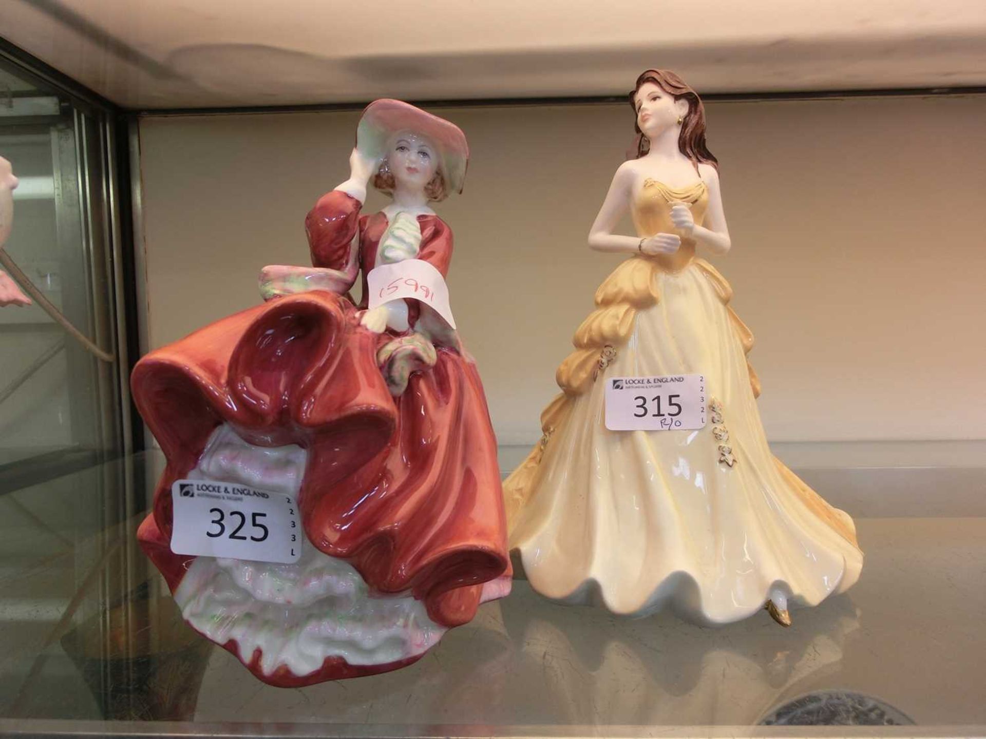 2 ceramic figurines incl. Royal Doulton, Top o' the Hill HN1834 and Coalport figurine, Golden