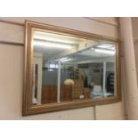 A gilt framed bevel glass mirror