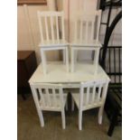 A child's table and four chair set