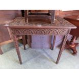 A 19th century carved oak free standing occasional tableDimensions: H: 73cmW: 76cmD: 47cm