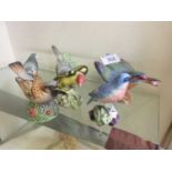 A collection of six Royal Worcester figurines of birds