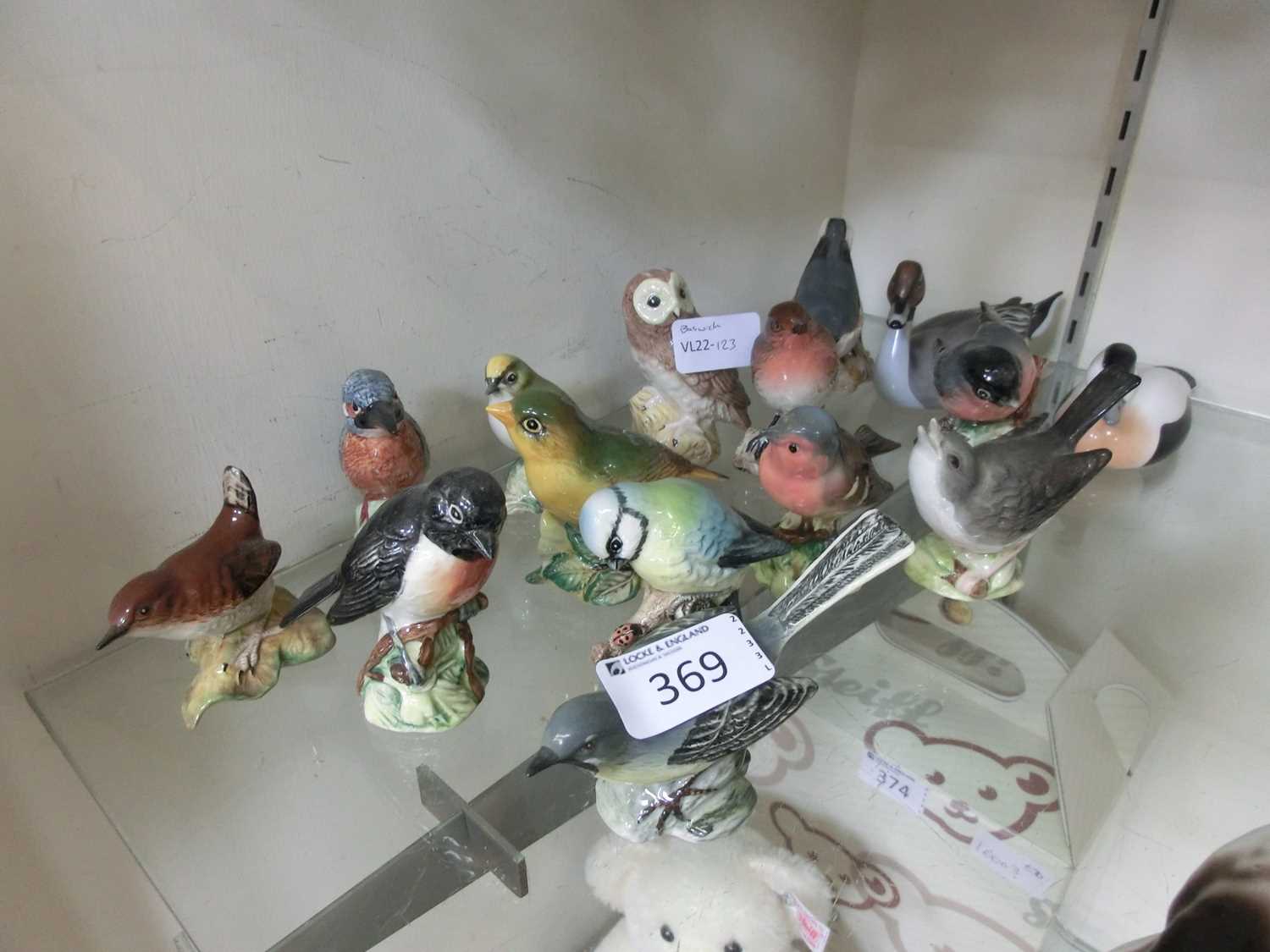 A collection of Beswick ceramic figurines of birds