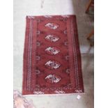 An eastern dark brown rug