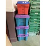 A collection of four PVC storage boxes (A/F)