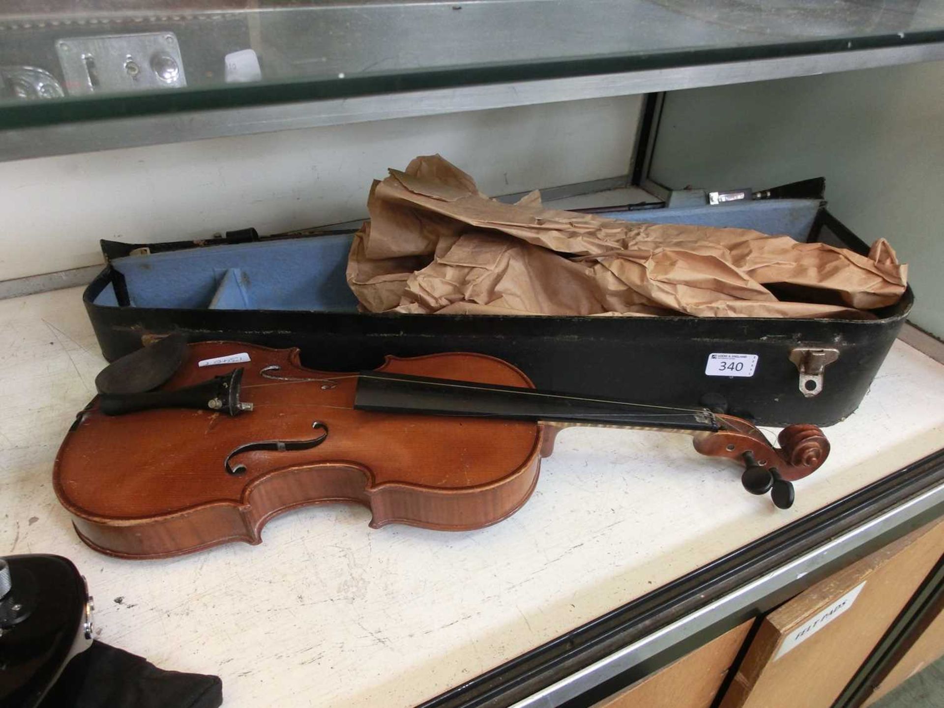 A 3/4 size violin with case and bow