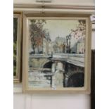 A framed oil on canvas of Parisian scene signed bottom left