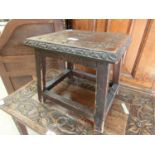 A 19th century carved oak stool