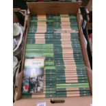 A tray of paperback Penguin booksPhotos available for date pages of 'Invisible Man' , 'Bullet In The